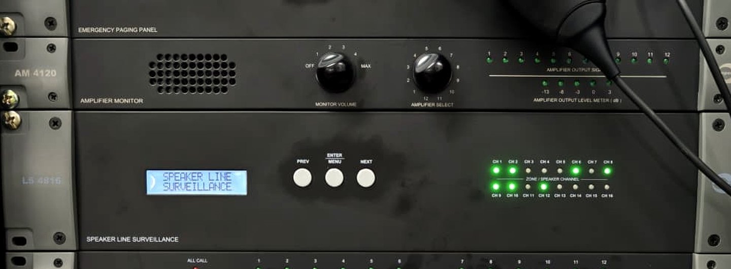 Amperes amplifier monitoring speaker line surveillance and zone control equipment in operation