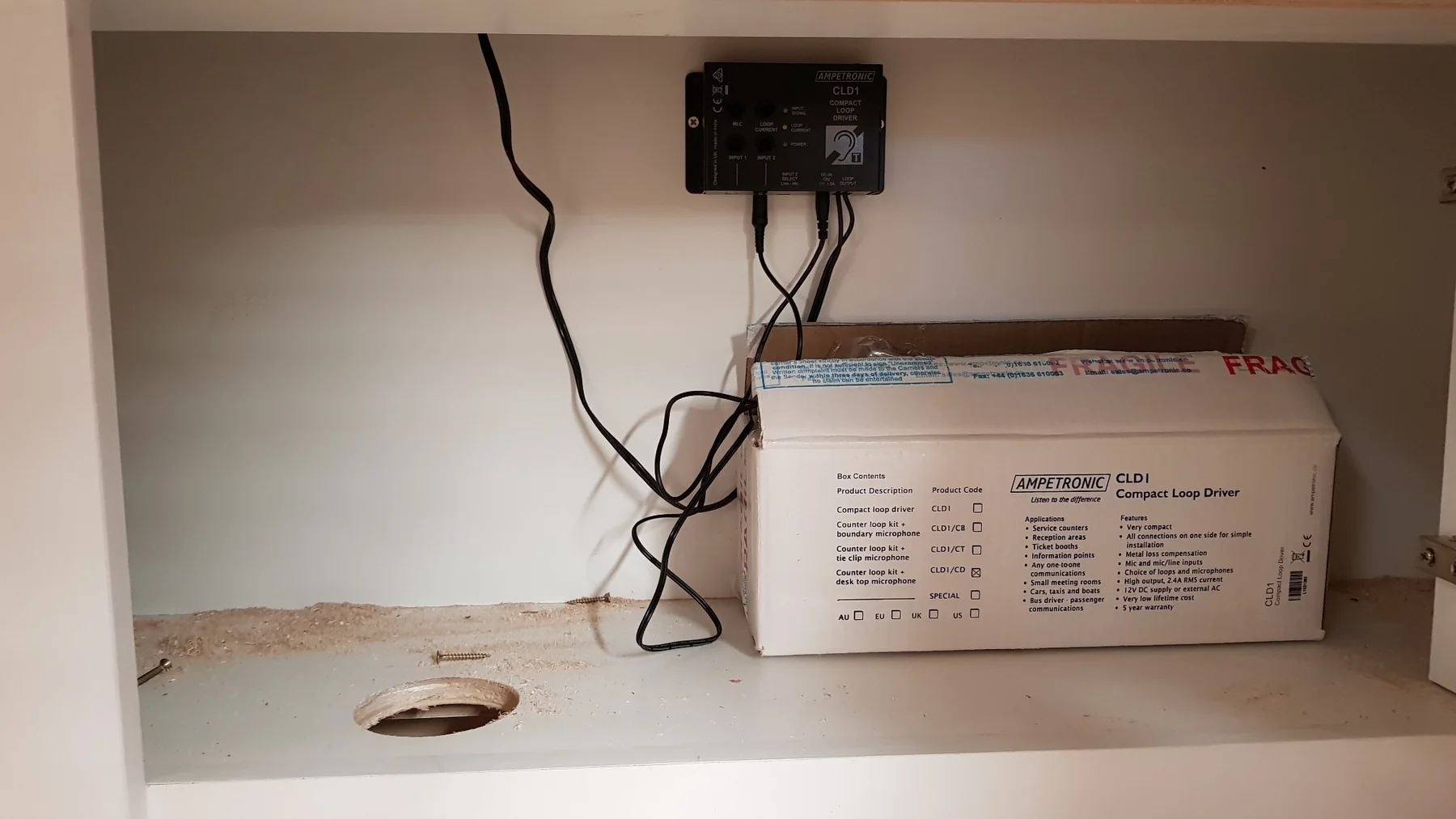 Ampetronic CLD1 compact loop driver installed in a service counter in Malaysia